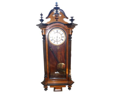A late 19thC walnut and ebonised cased wall clock, brass dial with enamel chapter ring, bearing Roman numerals, eight day mov
