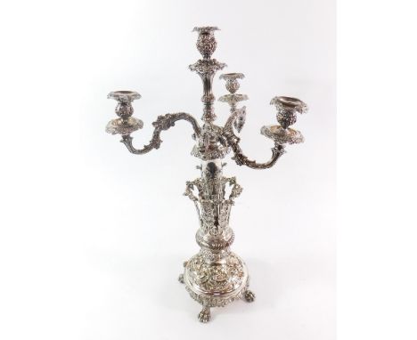 An impressive 19thC Sheffield plate candelabra, with three detachable upper branches, raised on a semi fluted vase stem, open