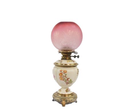 A Royal Worcester blush porcelain and brass oil lamp, late 19thC, of fluted form painted with floral sprays, with an etched g