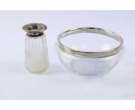 A George V cut glass and silver mounted fruit bowl, Birmingham 1924, 19cm dia, together with a cut glass jar with silver moun