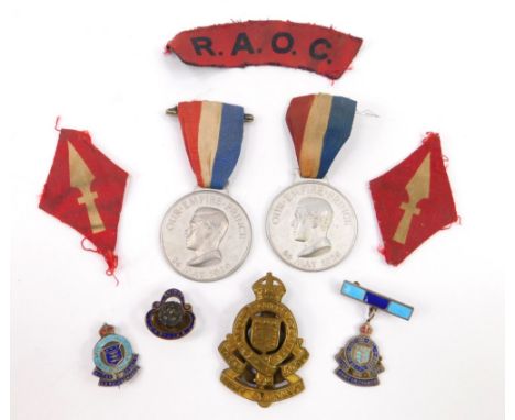 Two silver and enamel Royal Army Ordnance Corps badges, a cap badge, jacket badges, Royal British Legion button hole and two 