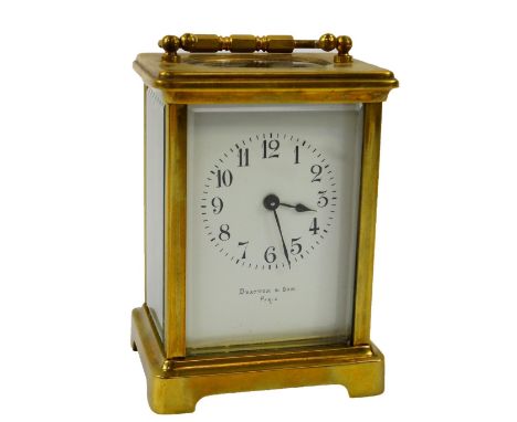 A French brass carriage clock, Drayton & Son Paris, enamel dial bearing Arabic numerals, single barrel movement, with key, 12