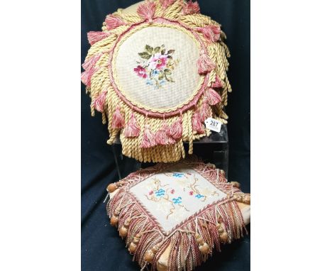 A pair of tapestry and braided Tasseled cushions, 36 cm square and 40 cm diameter. Good Condition 