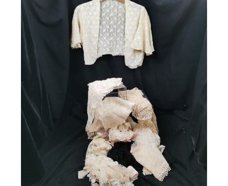 Box of assorted lace, includes collars, a blouse, etc. all in good used condition. 