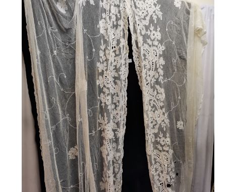 Pair of curtains applique on net, damage at bottom 335 x 150cm 
