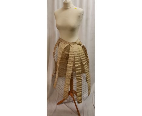 Cream Mannequin plus an antique bustle 