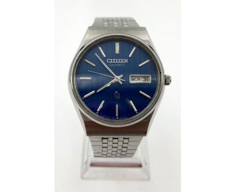 Vintage Citizen Quartz Gents Watch. Stainless steel strap and case - 35mm. Blue dial - in working order. 