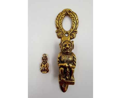 A Vintage Brass Pixie Door Knocker. Comes with a bonus Cockington Pixie Charm! 12 and 3cm.