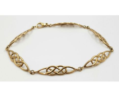 A 9 K yellow gold bracelet with Celtic knots. Length: 18.5 cm, weight: 4.6 g. 