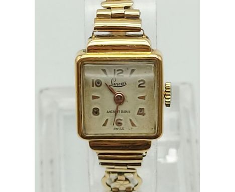 A Vintage Swiss Made 18K Yellow Gold Cased Lunesa Ladies Watch. 9K Yellow Gold pierced-link strap. 18k Yellow gold case-15 x 