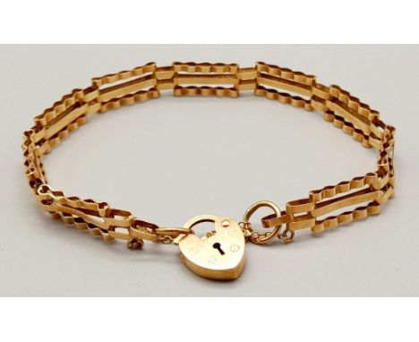 A Vintage Three-Bar Link 9K Yellow Gold Bracelet with Heart Clasp. 18cm. 5.24g 