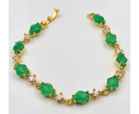 A Jade and White Topaz Gold Plated Bracelet. 17cm 