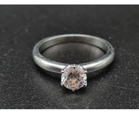 A Platinum 0.50ct Diamond Solitaire Ring. Size K 1/2. 3.9g 