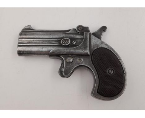 A Vintage Metal Reproduction of a Derringer Style Double Barrel Pistol with working action 