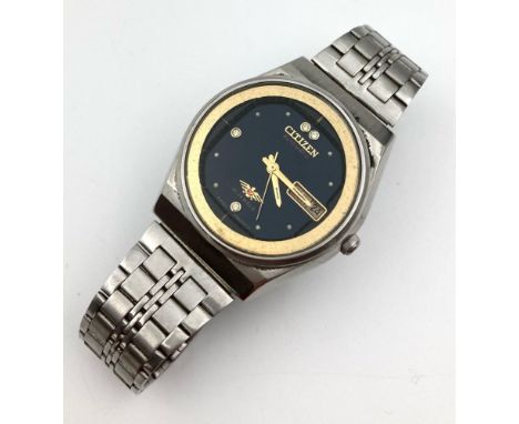 A Vintage Citizen Eagle 7 Automatic Gents Watch. Stainless steel strap and case - 36mm. Black dial with day and date window. 