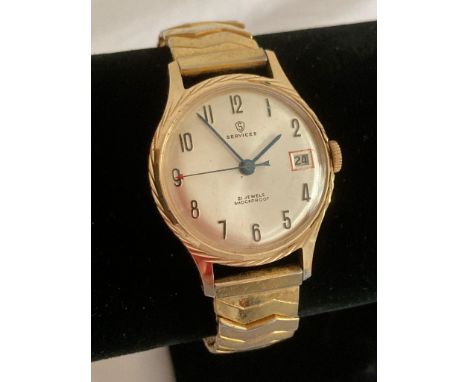 Vintage SERVICES Gentlemans wristwatch in full working order.Gold Tone. Manual winding with sweeping second hand with red arr