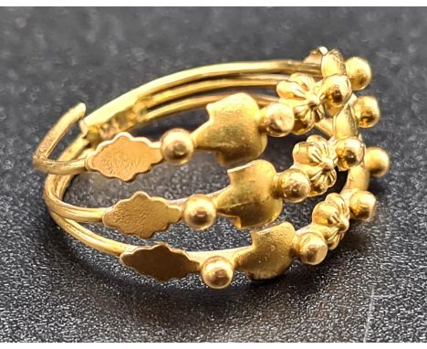 A 21 K yellow gold triple ring. Ring size: M, weight: 3.1 g. 