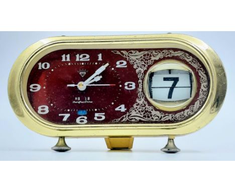 A Vintage Chinese Retro Desk Clock. Red dial with date window. In working order. 20 x 11cm. 