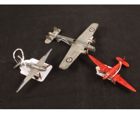 Three Dinky Toys aircraft, 60g D.H.Comet in grey/blue, 62m light transport plane in red G-ATMH and 60V Armstrong Whitworth bo
