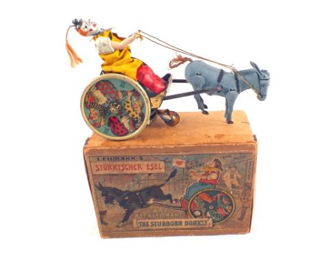 A boxed Lehmann tin plate clockwork The Stubborn Donkey with clown figure and leaflet
