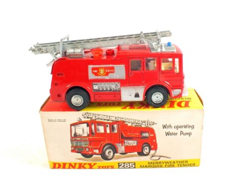 A boxed Dinky 285 fire engine