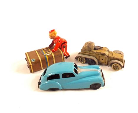 Three tin plate clockwork toys, a CKO Kellermann armoured vehicle, Gescha express boy and a Wells Brimtoy pocketoy blue car
