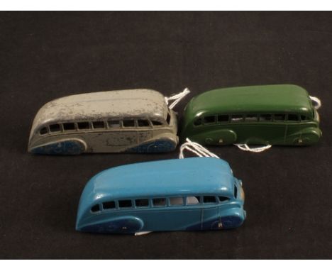 Three Dinky Toys 29b streamlined bus, grey/blue, light blue/dark blue and green/light green