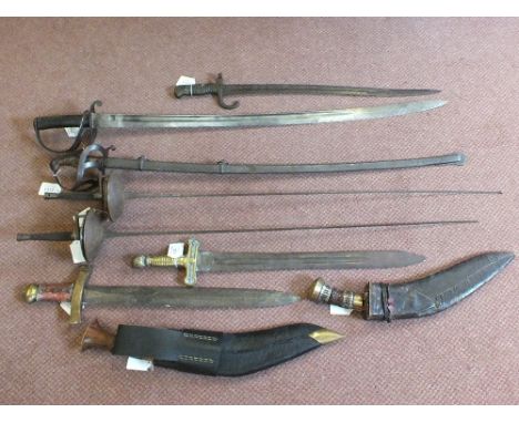 Nine edged items, 1856 model Cavalry Troupers sword with brass hilted bandsman sword and one other, a 19th Century continenta