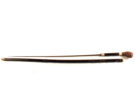 A vintage sword stick within scabbard with silver collar