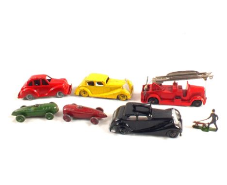 A selection of Crescent die cast including two early racing cars (red and green), red saloon car, yellow saloon car, fire eng