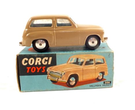 A boxed Corgi Toys 206 Hillman Husky in light tan body (one end flap missing)