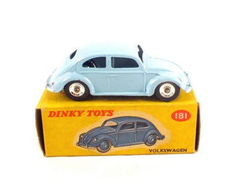 A boxed Dinky Toys 181 Volkswagen in light blue with black wheels and unpainted hubs