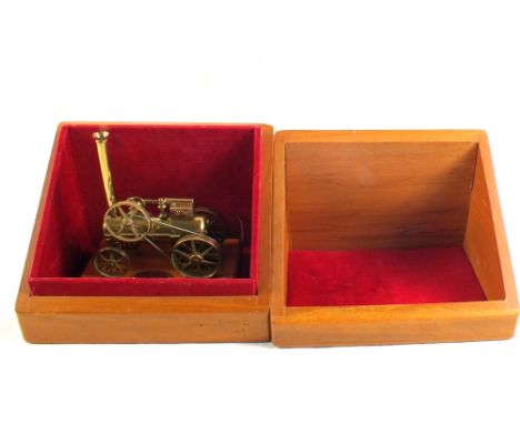 A boxed brass model of Thomas Avelings Traction Engine 1858