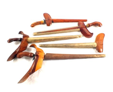 A collection of four Krises with scabbards and a lone scabbard (some as found)