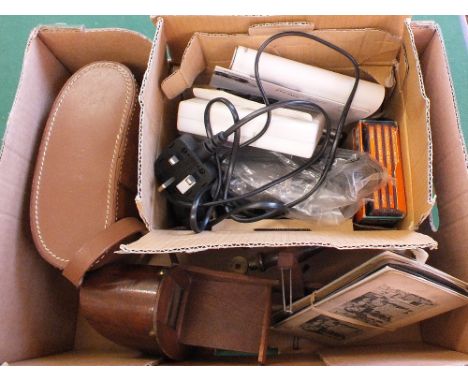 A stereo viewer and cards plus a Panasonic DVD camera and a cased set of binoculars