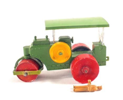 A boxed Charbens die cast road roller with operator