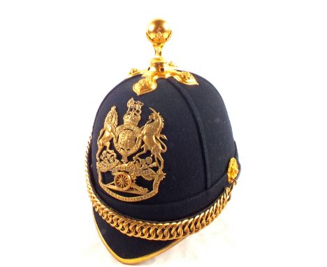 A post 1902 British Royal Artillery Officer's Home Service helmet in outstanding condition with named storage tin to Capt J.M