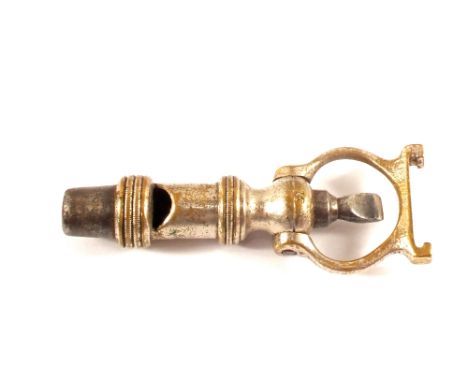 A vintage 12 bore cartridge extractor/multi took with built in whistle