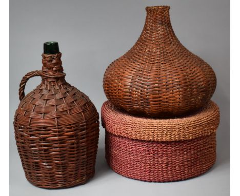 A Wicker Covered Glass Bottle, Wicker Lamp Shade and Cylindrical Box 