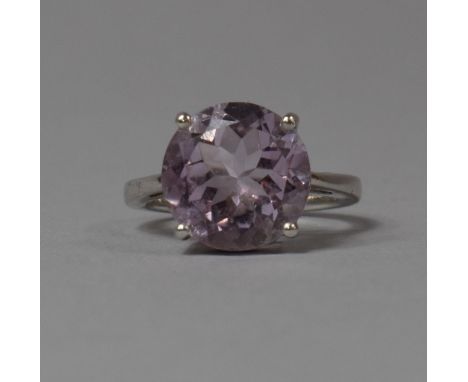 A Silver Ladies Dress Ring with Amethyst Solitaire Stone 