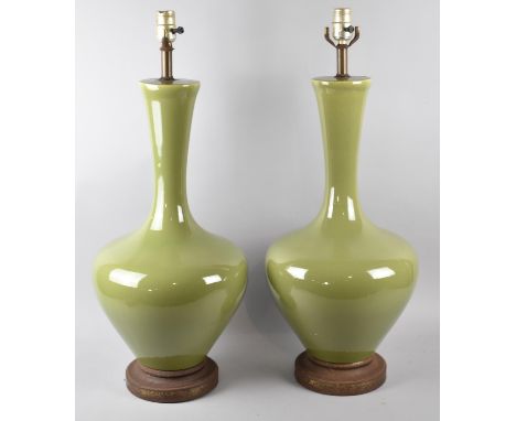 A Large Pair of Elegant Green Glazed Ceramic Table Lamps, 70cm High, One AF 