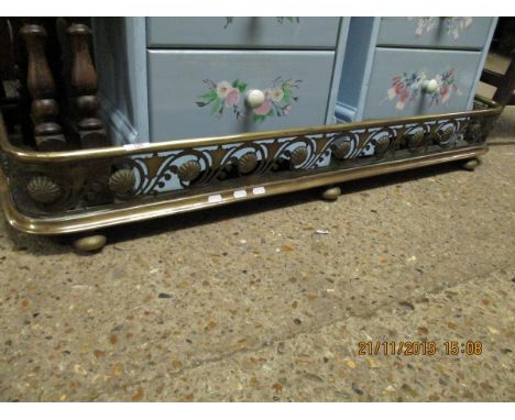 BRASS PIERCED FRONTED FENDER RAISED ON BALL FEET