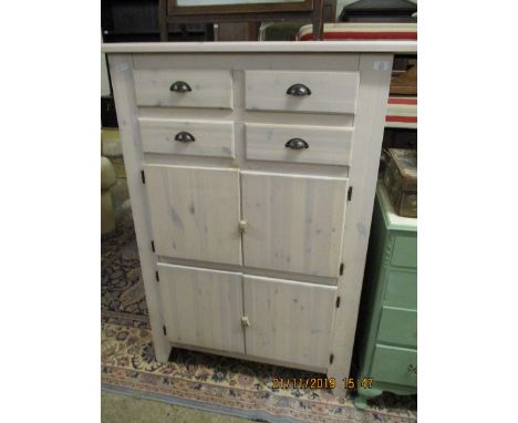 WHITEWASHED PINE FRAMED CUPBOARD WITH FOUR DRAWERS AND FOUR CUPBOARD DOORS