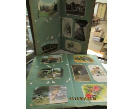 TWO ALBUMS CONTAINING VINTAGE POSTCARDS