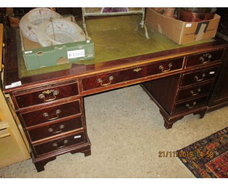REPRODUCTION MAHOGANY TWIN PEDESTAL DESK WITH NINE DRAWERS WITH BRASS SWAN NECK HANDLES RAISED ON BRACKET FEET