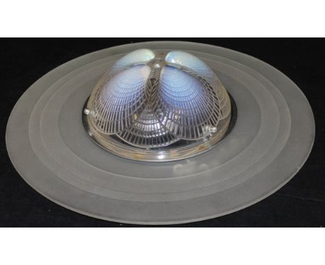 A René Lalique "Coquilles" pattern ceiling light or plafonier, moulded in high relief as four scallop shells with a slight bl