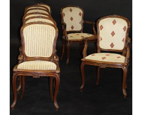 A set of eight French mahogany framed open arm elbow chairs, the top rails decorated with ribbon tied portrait medallions rep