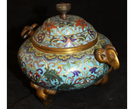A 19th Century Chinese cloisonné bowl and cover, the light blue ground with foliate decoration and turned brass finial, the o