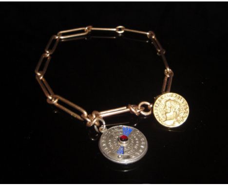 A 9 carat gold watch chain with elongated open links, approx 21g, mounted with a brass button depicting Roman Emperor and a p