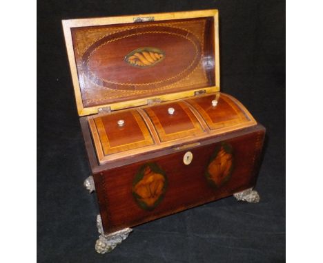 A George III mahogany and marquetry inlaid dome top three section tea caddy, the dome top cross banded in ebony and box wood 